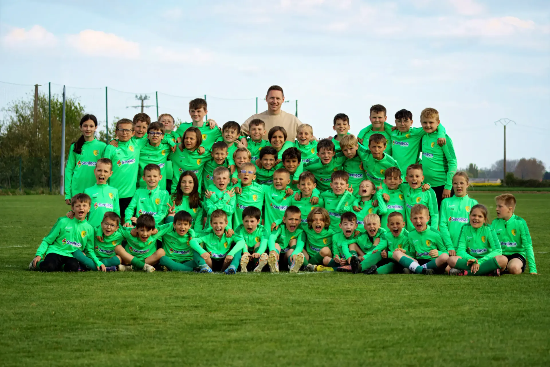 Youth academy photoshoot — 50+ players in branded Senlecq kits